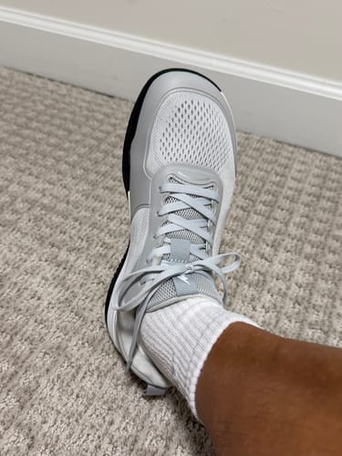 A customer's top-down view of their light gray CUURT Muuv court shoe, showing the wide toe box.