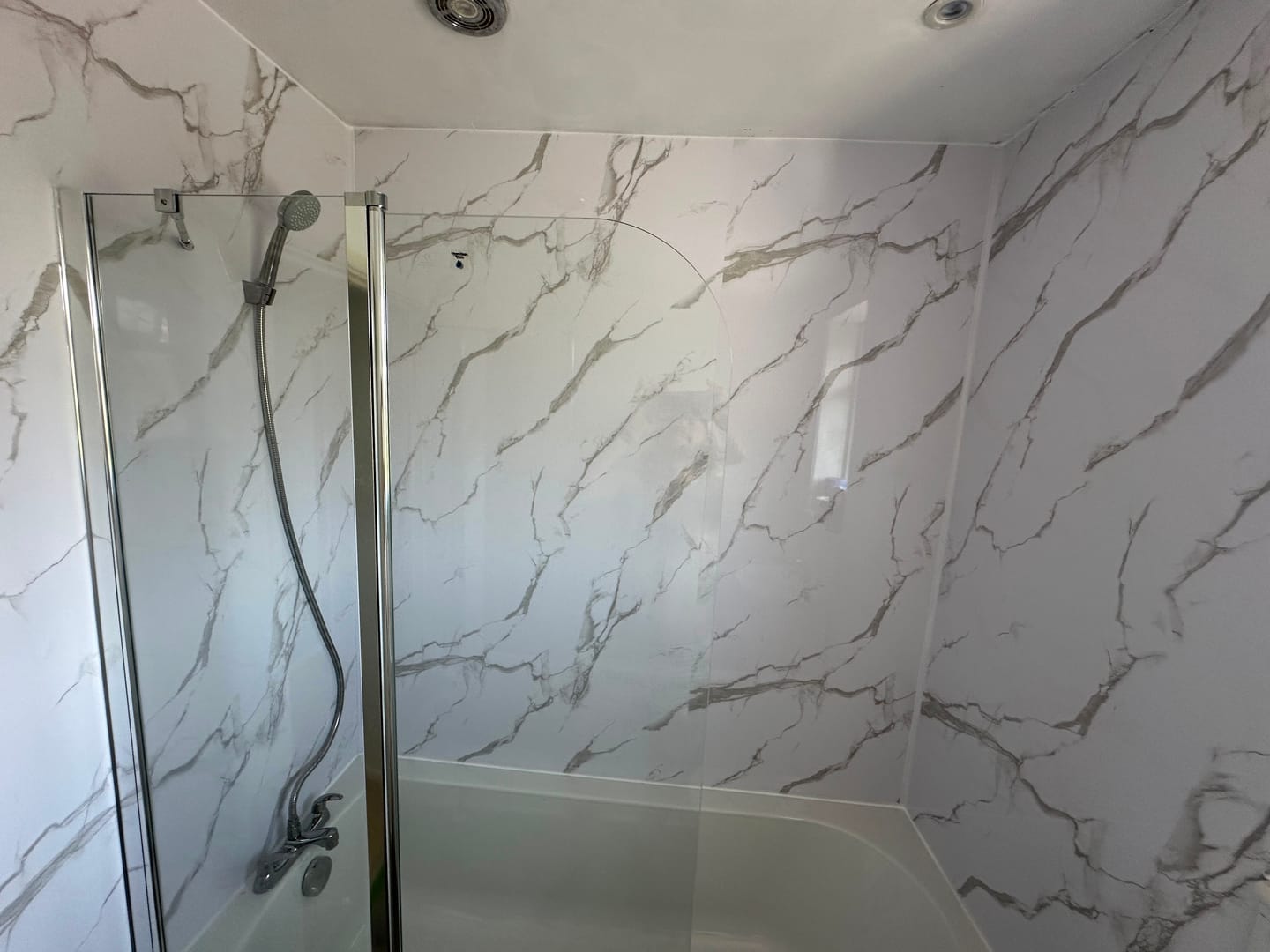 Customer photo review of Premium Carrara White Marble Gloss Shower Wall Panel - 1M x 2.4M