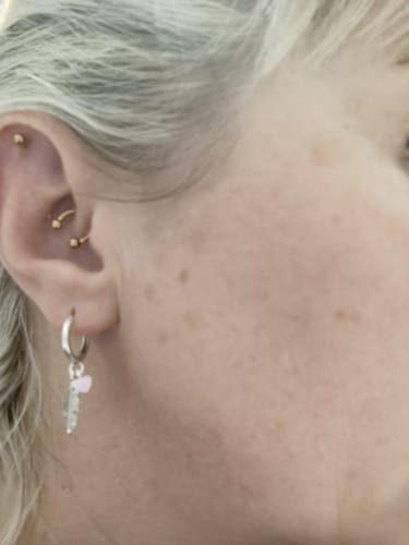 Customer photo review of Pendientes Plumas de Amor
