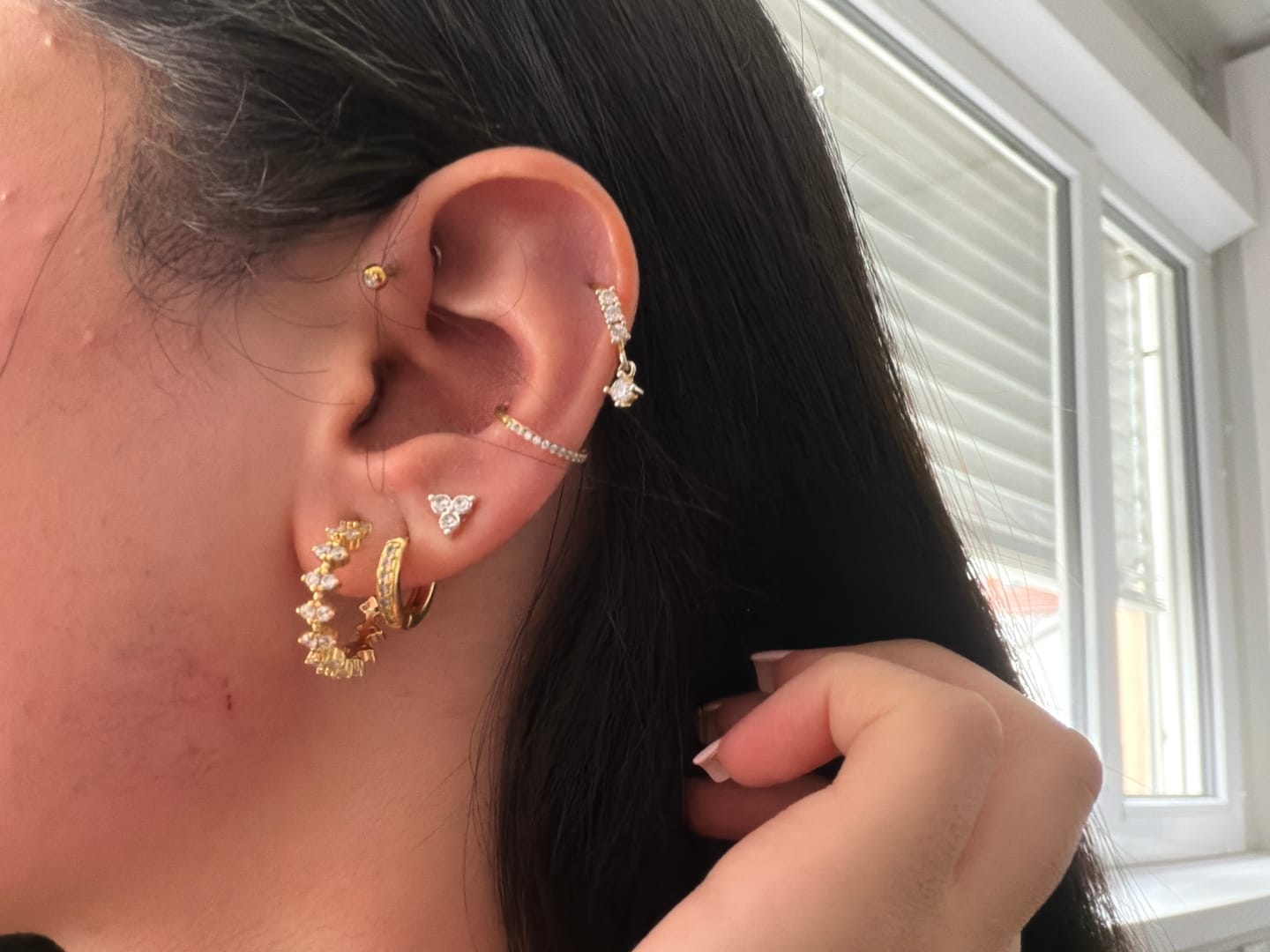 Customer photo review of Conch Clicker | Titan Piercing