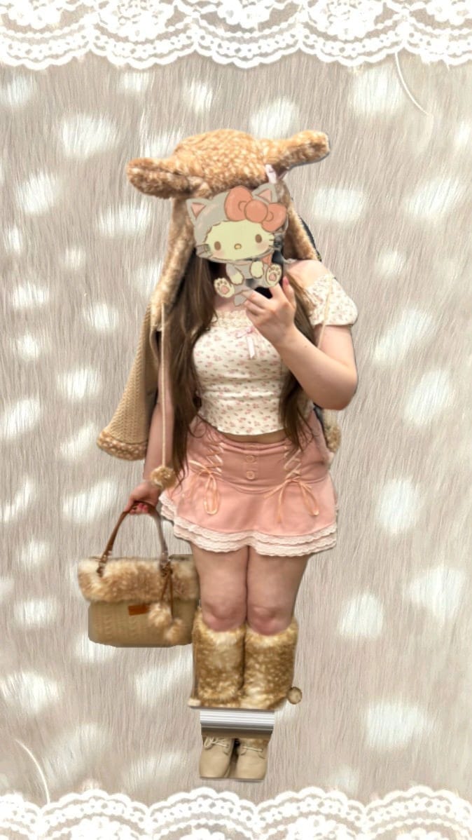 Customer photo review of Rose Island Deer Knit Cape