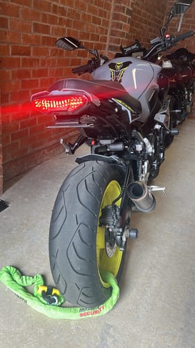 Customer's Yamaha MT10 with the integrated rear light installed, showing the bright left indicator illuminated.