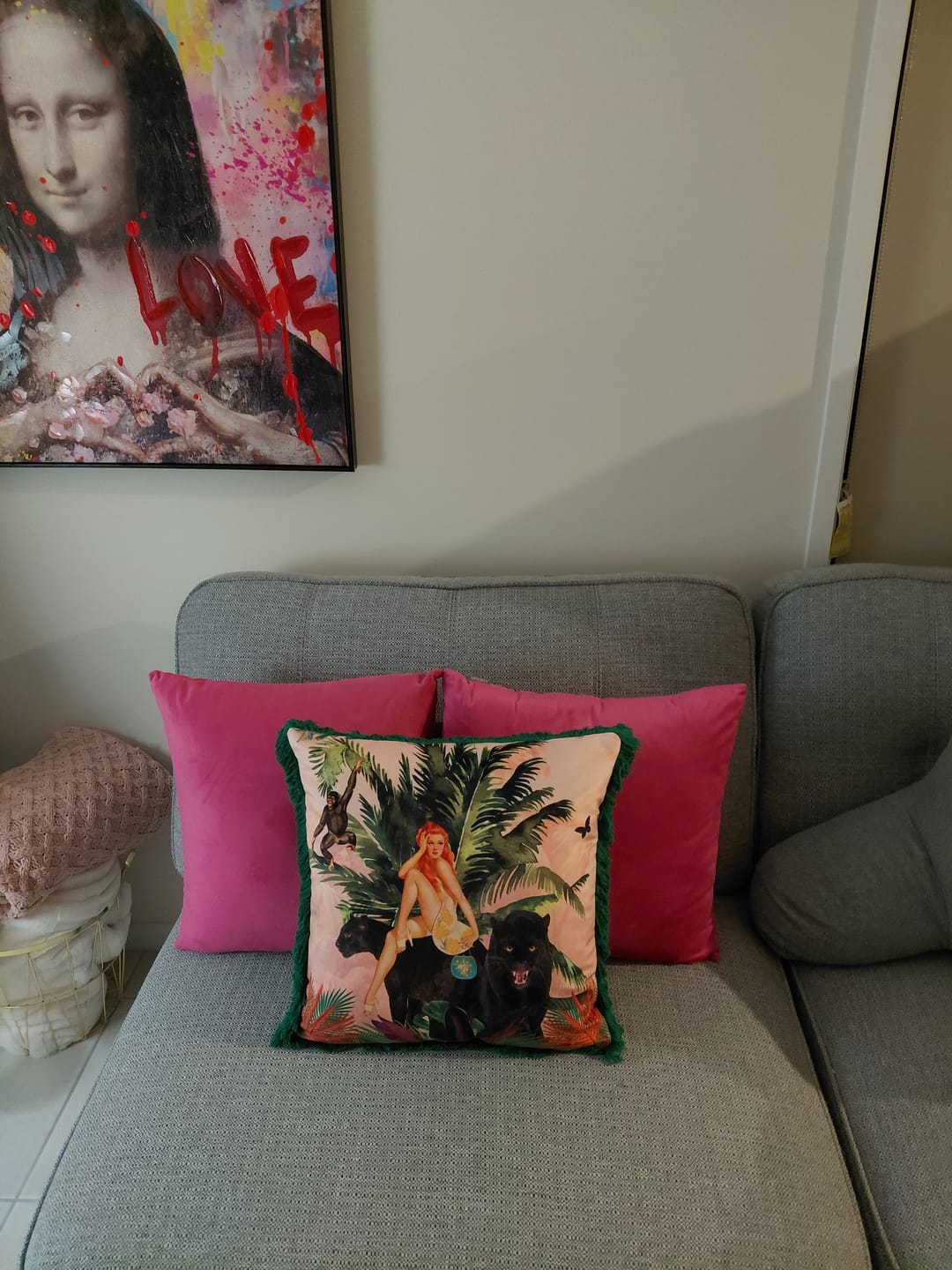Customer photo review of Queen K Jungle Print Pink Cushion with Fringe