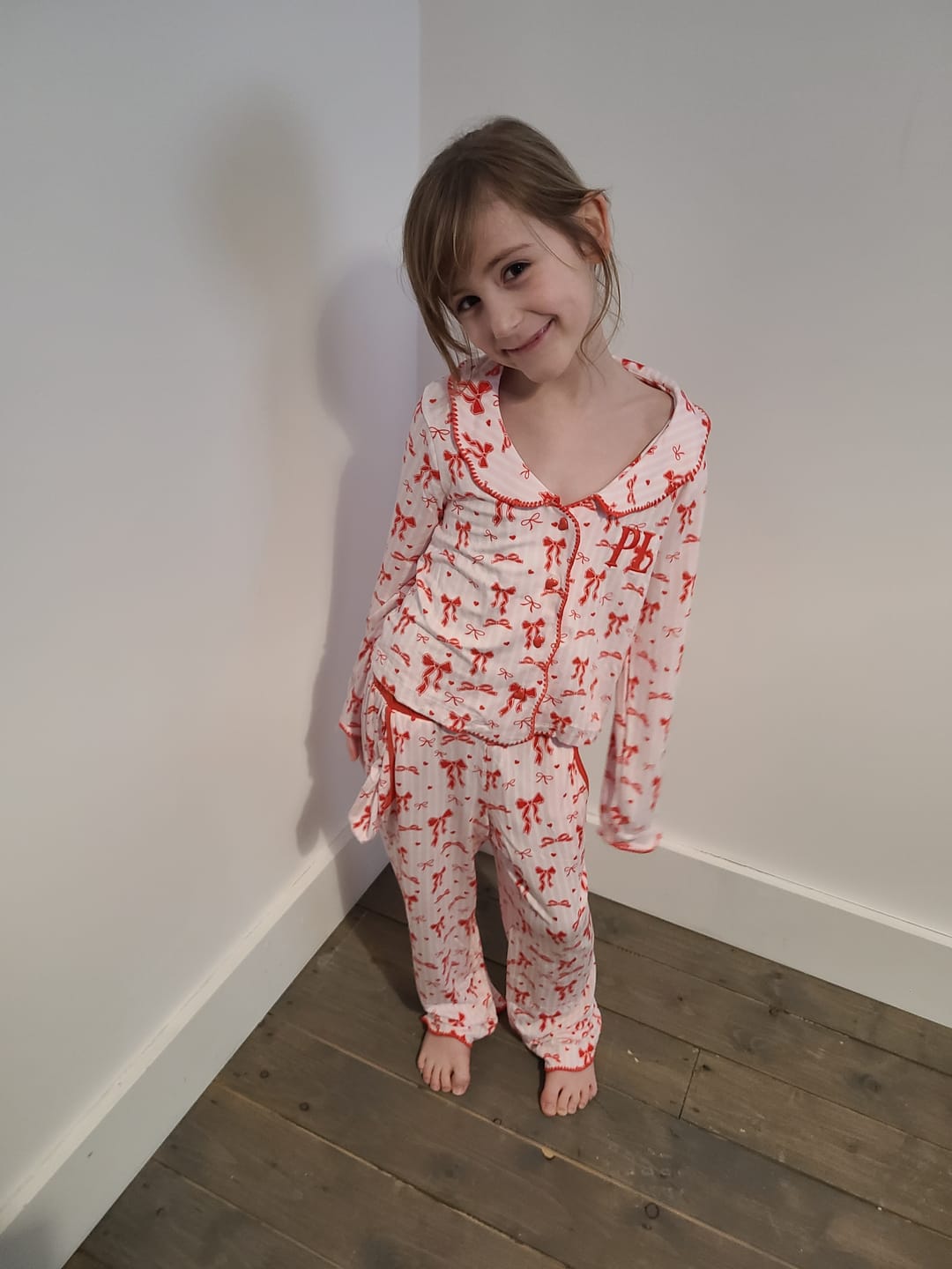Customer photo review of P.Louise Girls Christmas Bow Pyjamas - Trousers Set