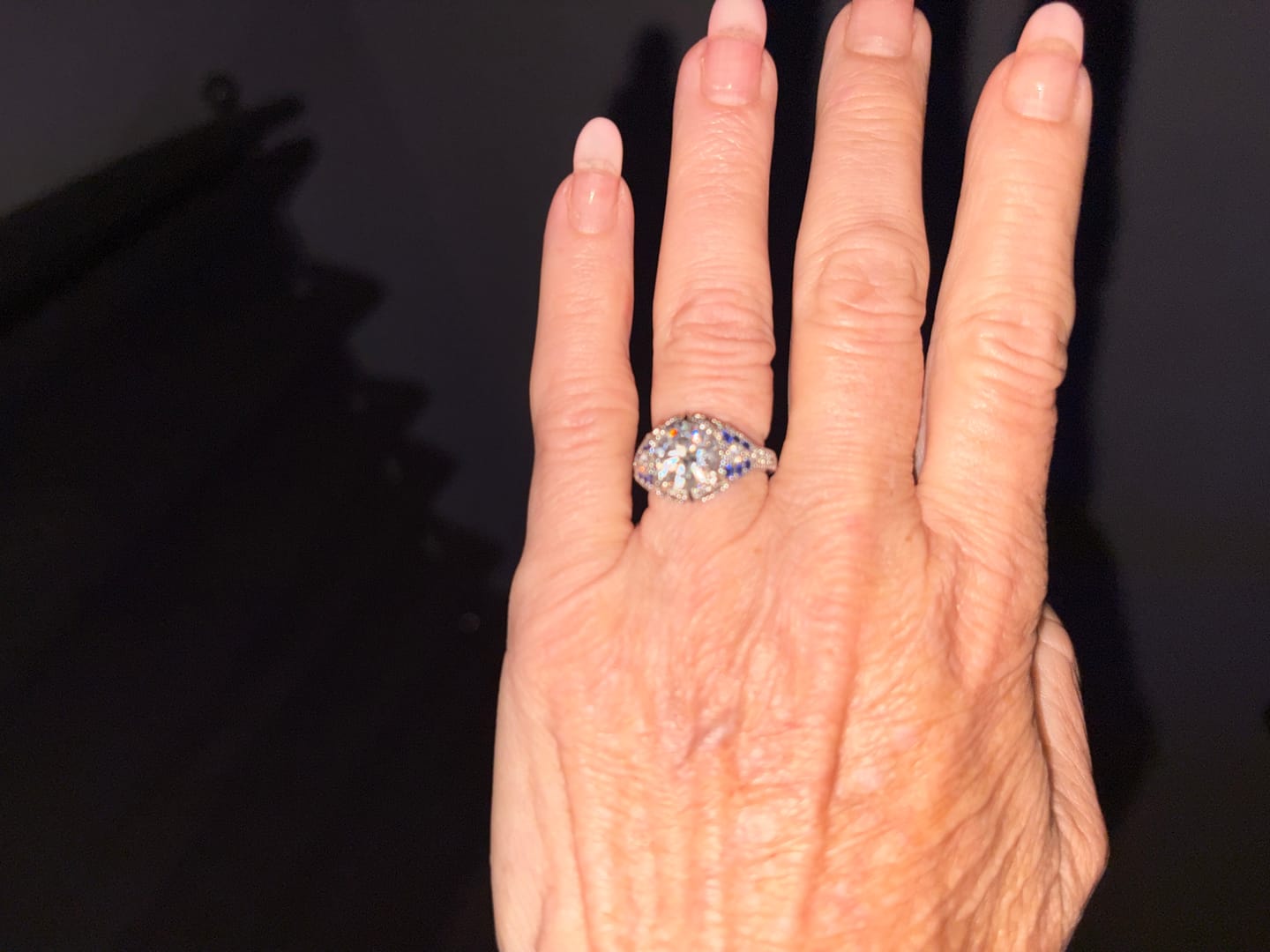 Customer photo review of Art Deco Gallery Vintage Moissanite Milgrain & Blue Accent Engagement Ring