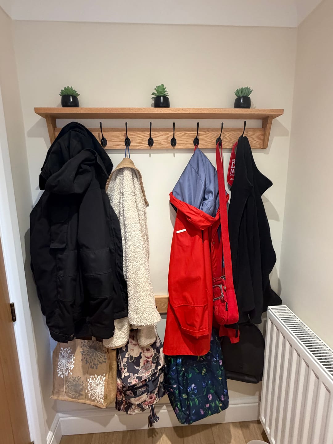 Customer photo review of Oak Coat Hanger