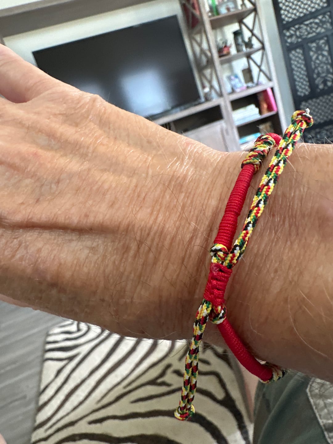 Customer photo review of Tibetan Buddhist Red String Bracelet – Handmade Feng Shui Protection & Good Luck Bracelet (5-Color Monk Thread)