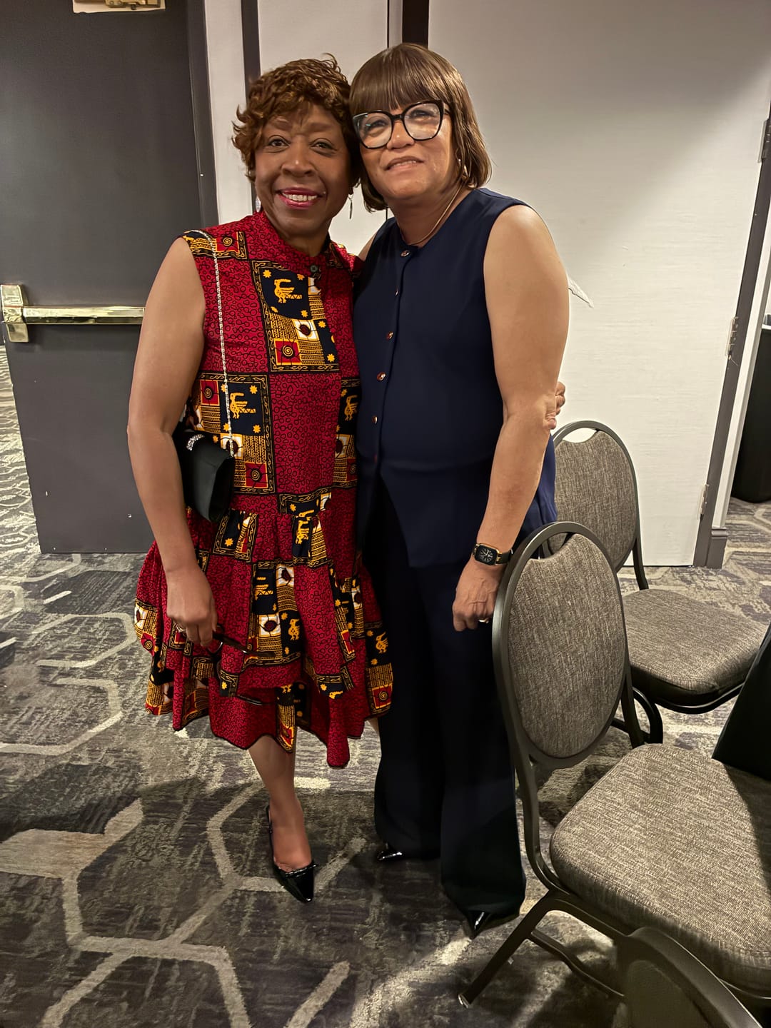 Customer photo review of LAILA AFRICAN PRINT SLEEVELESS TIERED BUTTON DRESS [RED]