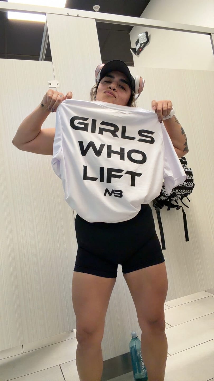 Customer photo review of "Girls Who Lift" Performance Unisex Tee