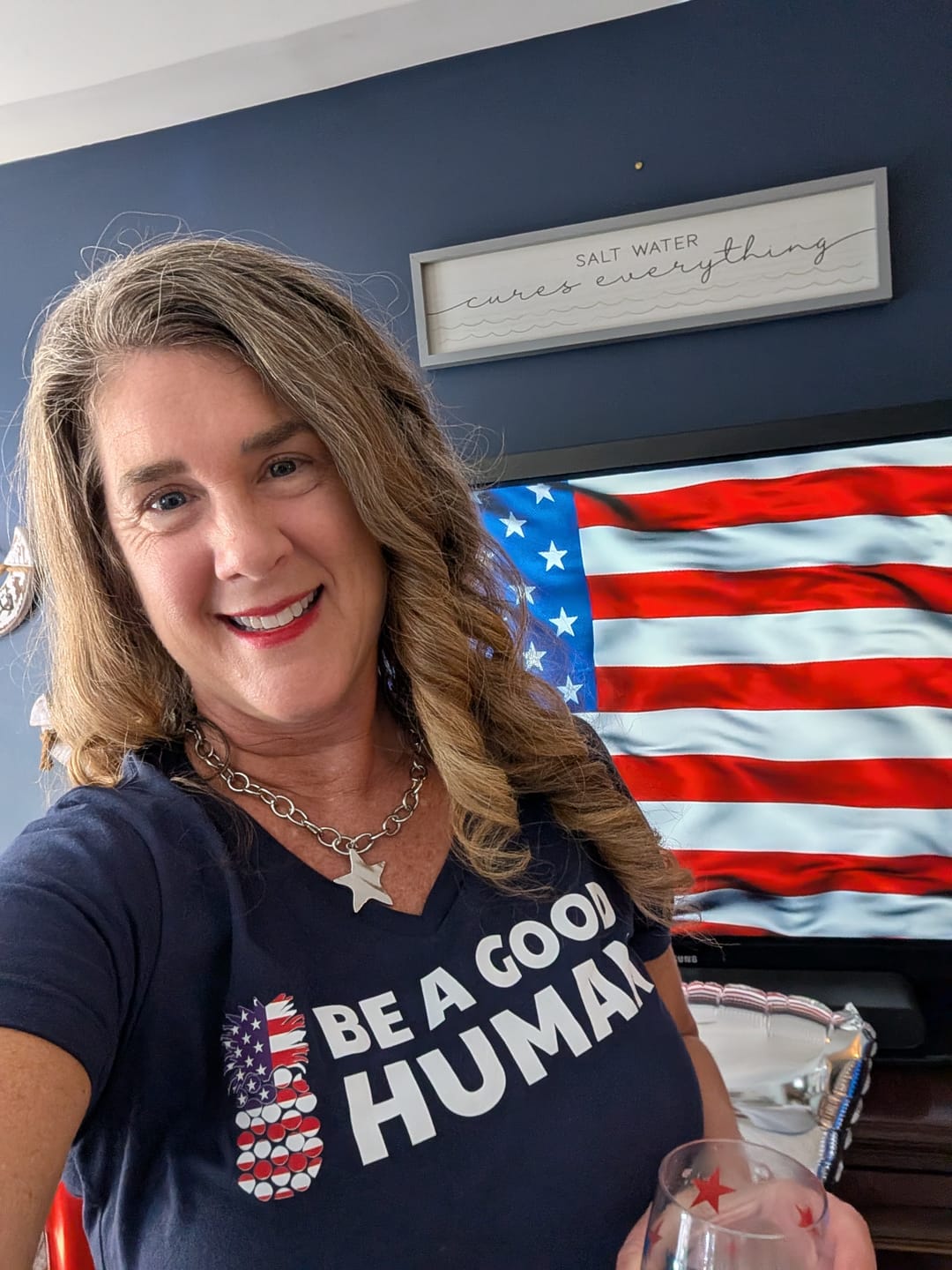 Customer photo review of Be A Good Human American Flag WOMEN'S V-NECK