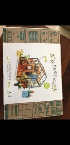 Customer photo review of Maison miniature La maison des fleurs de Cathy