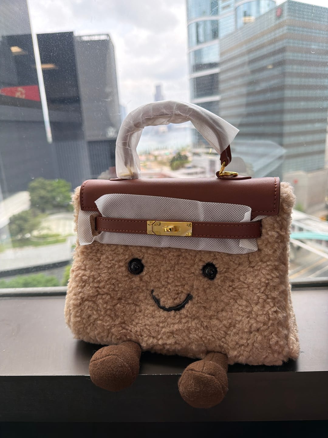 Customer photo review of Carrier Mallow - תיק יד רך