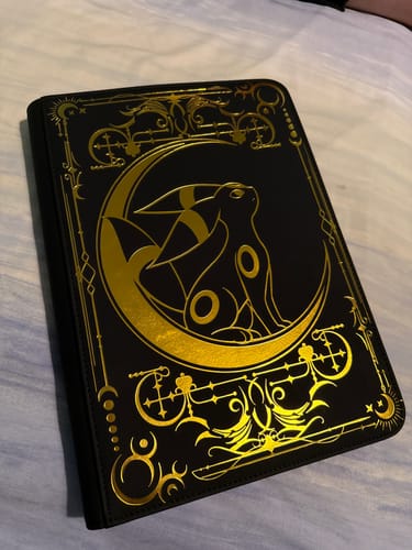 Customer photo review of Lunar Shadow 9-Pocket Trading Card Binder