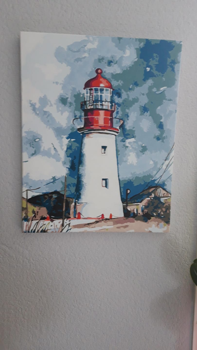 Customer photo review of Phare sous un Ciel chargé