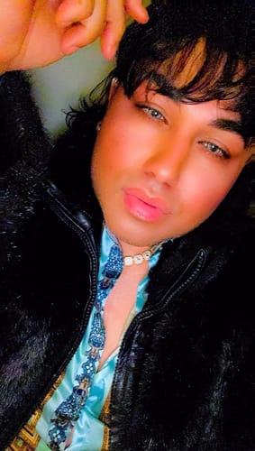 Customer in a close-up photo wearing the Calytrix Gray Colored Contact Lenses.