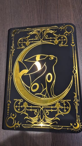 Customer photo review of Lunar Shadow 9-Pocket Trading Card Binder