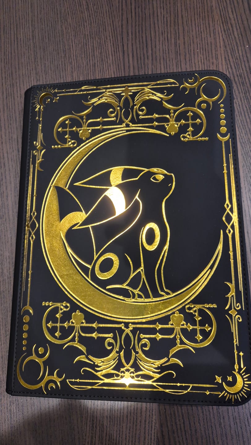 Customer photo review of Lunar Shadow 9-Pocket Trading Card Binder