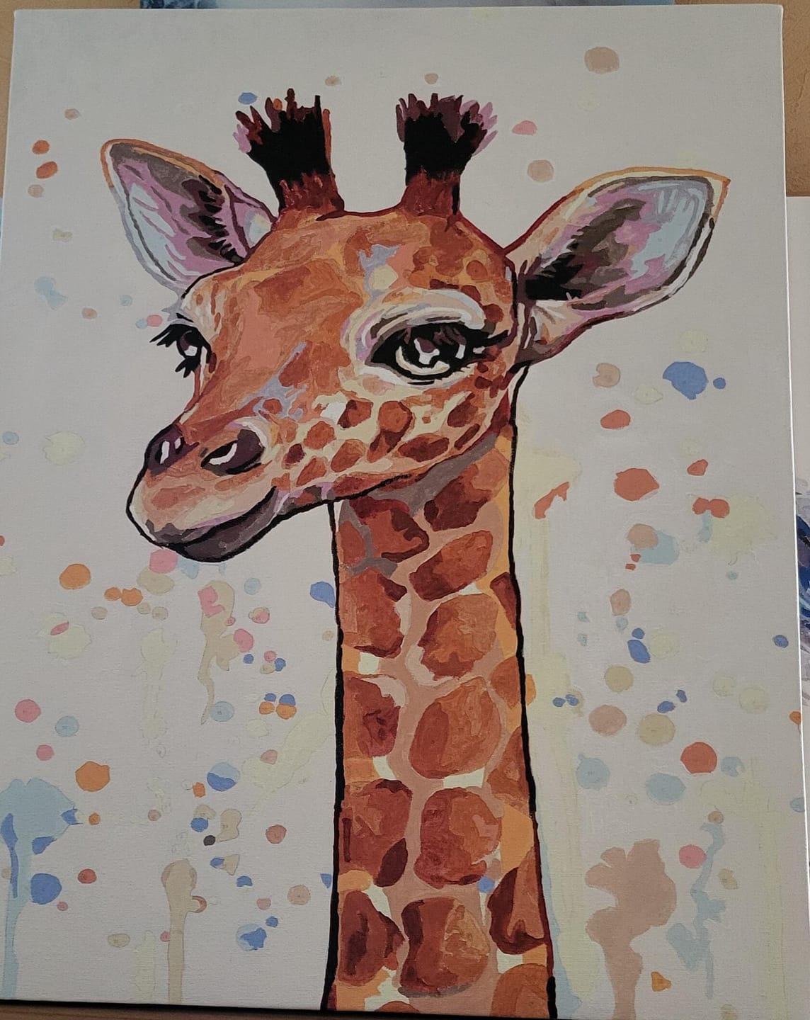 Customer photo review of Girafe souriante