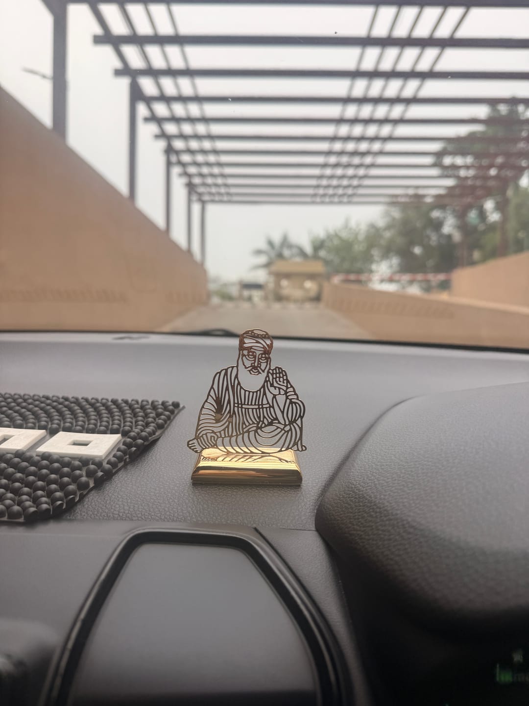 Customer photo review of Car Dashboard Stand Goldplated -  Guru Nanak Dev Ji