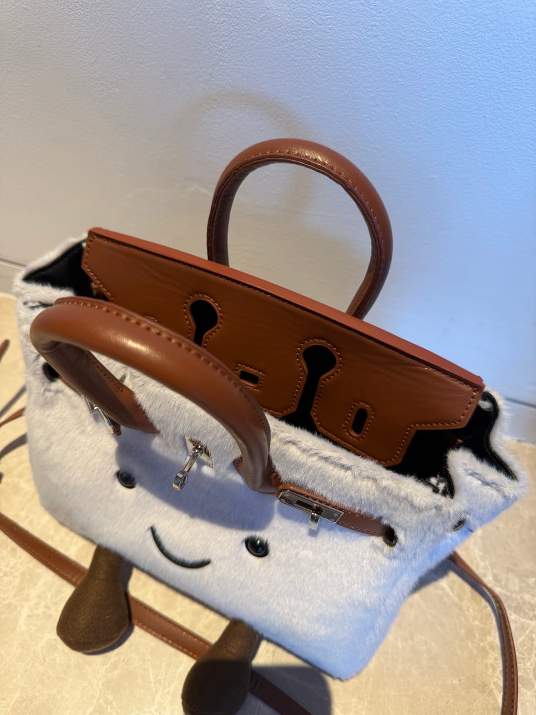 Customer photo review of Carrier Mallow - תיק יד רך