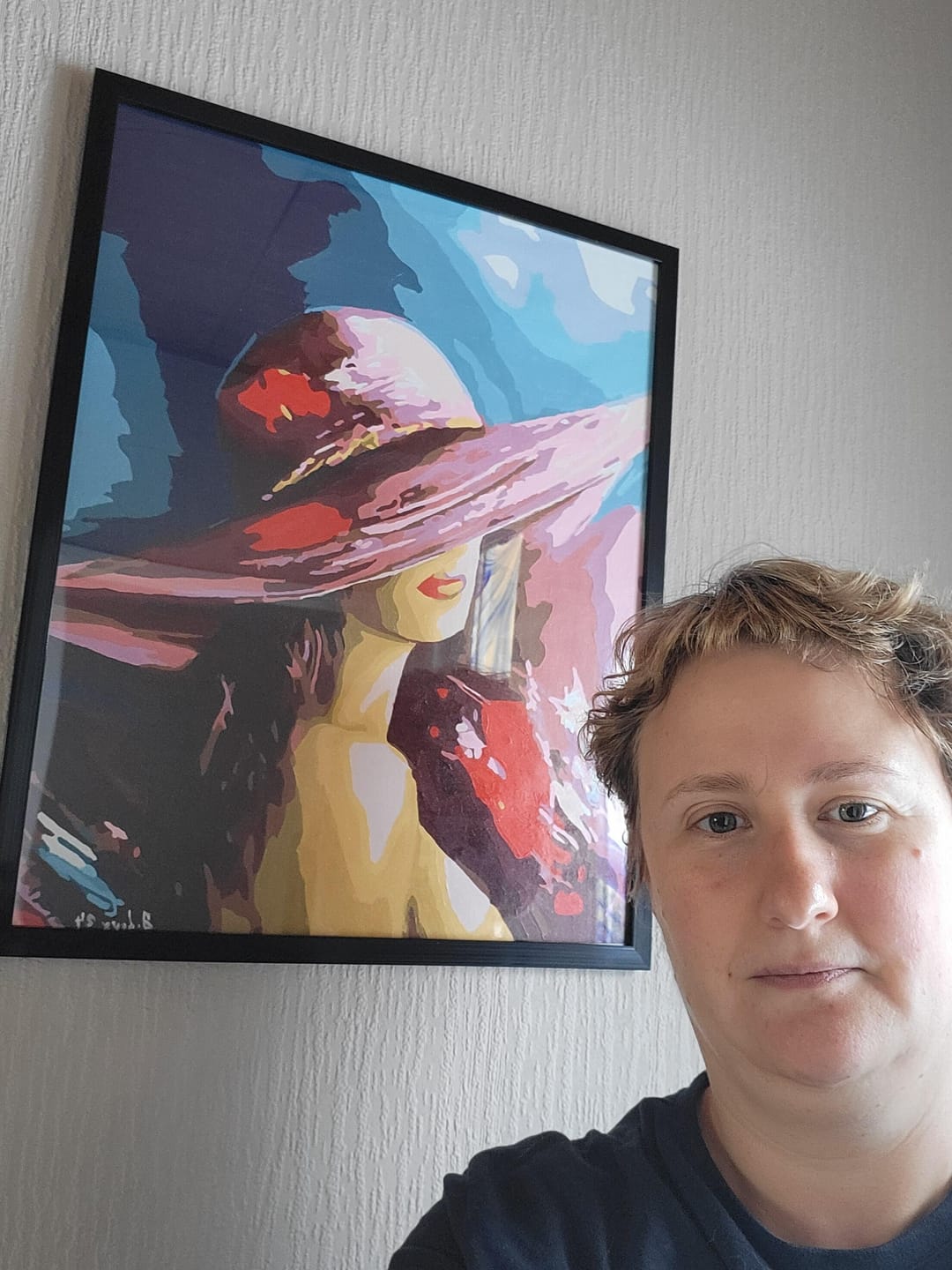 Customer photo review of Femme séduisante au chapeau