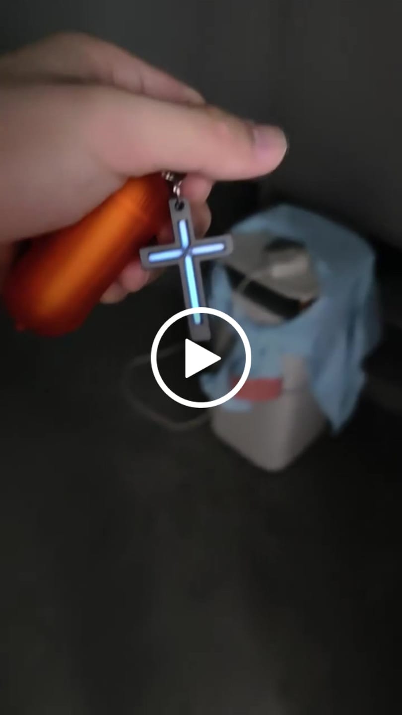 Customer video review of Cyber Tritium Cross Pendant