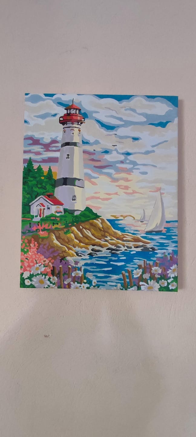 Customer photo review of Phare sous un Ciel nuageux