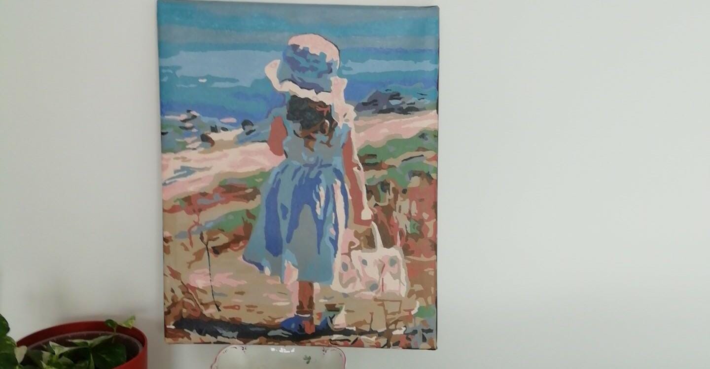 Customer photo review of Fillette avec son sac à la Plage