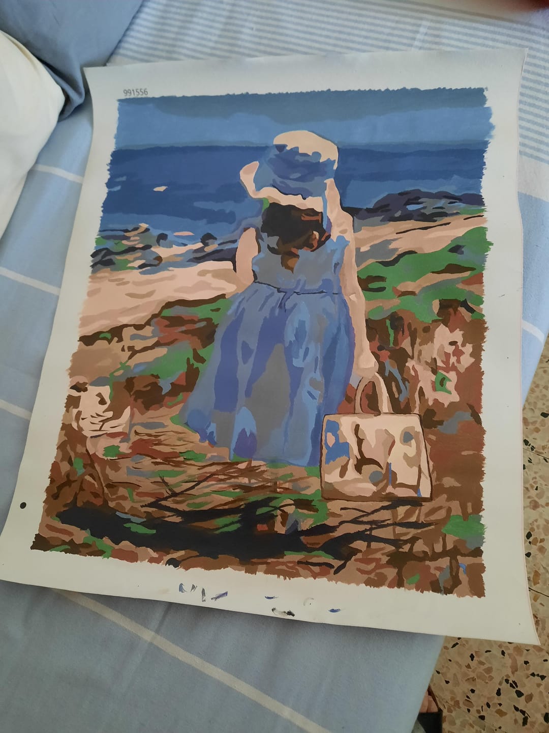 Customer photo review of Fillette avec son sac à la Plage