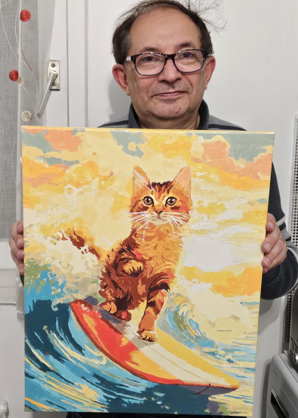 Customer photo review of Chat surfeur
