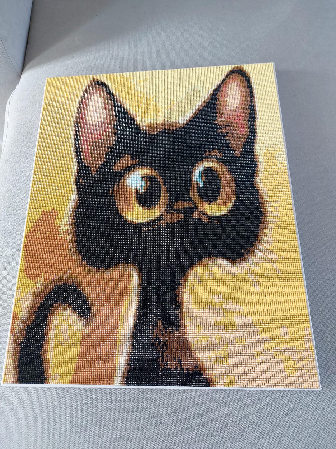 Customer photo review of Broderie Diamant - Chat étonné 40x50cm toile tendue sur châssis
