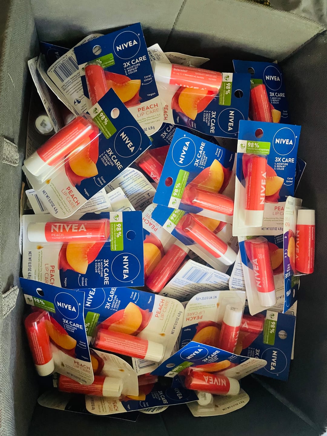 Customer photo review of Nivea Peach Lip Care Lip Balm 0.17 Oz (110 Pcs Lot)