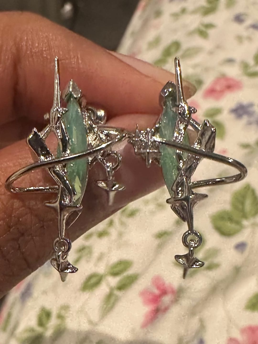 Customer photo review of "Star Trails" Platinum Plated Celestial Star Trails Moissanite Statement Stud Earrings