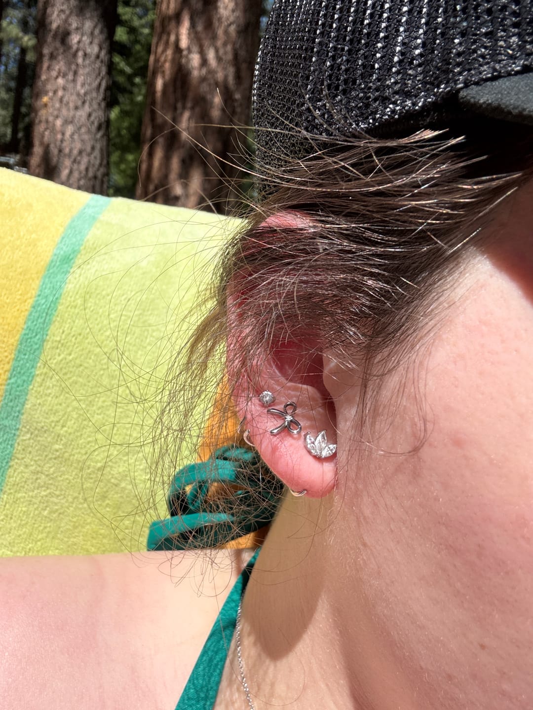 Customer photo review of Coco Bow Comfort Earrings — Silver