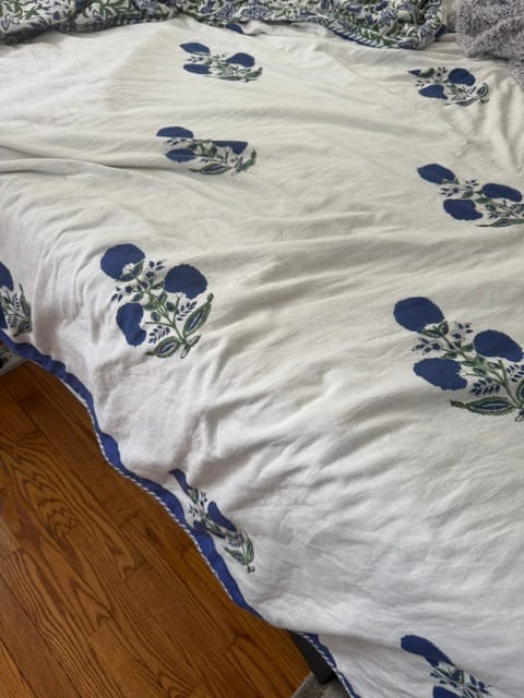 Customer photo review of Iris Organic Mulmul Blanket — Hand Block Printed