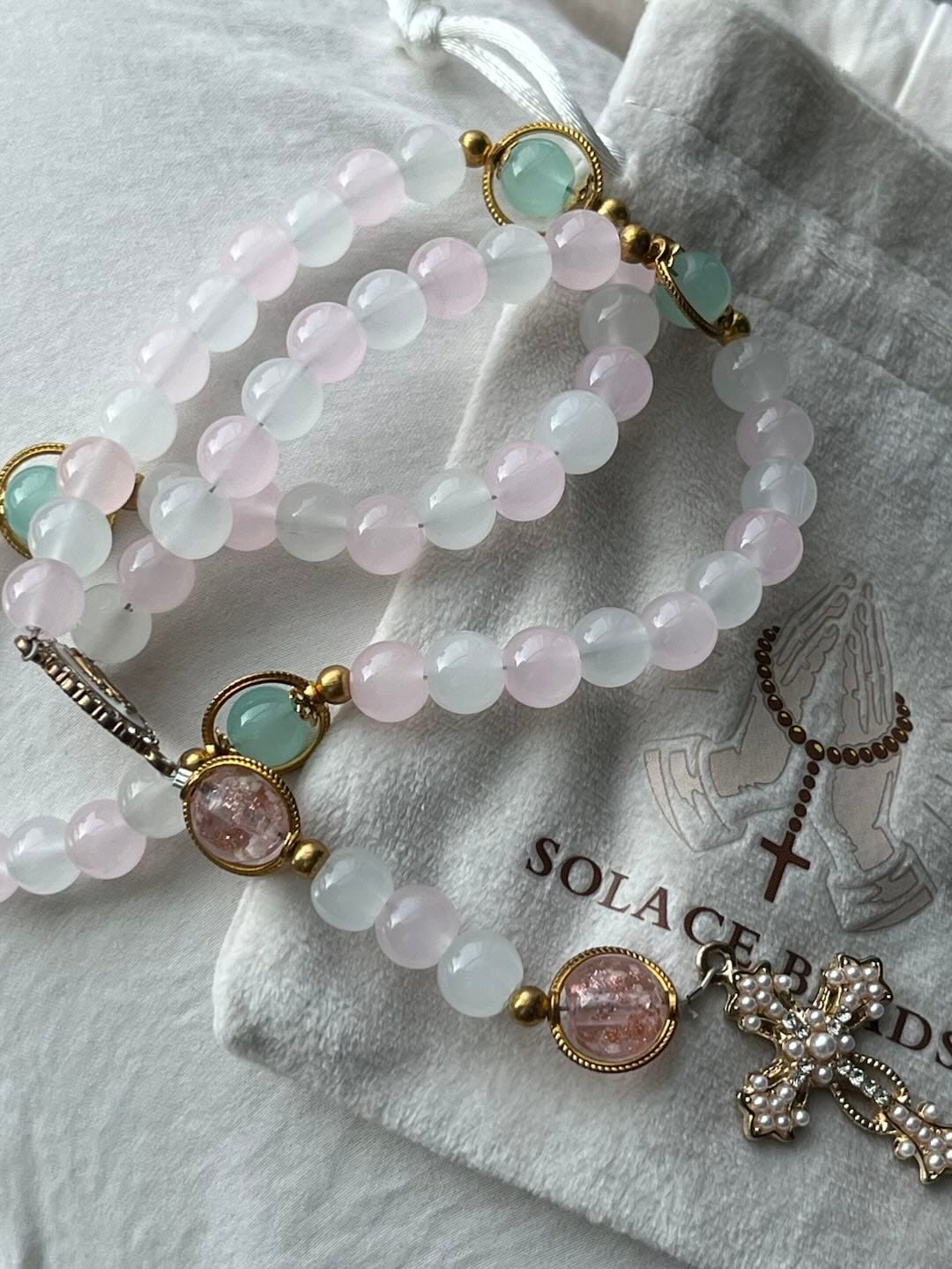 Customer photo review of SolaceBeads Artistic Pink & White Beaded Rosary: A Fusion of Colors & Sacred Symbols