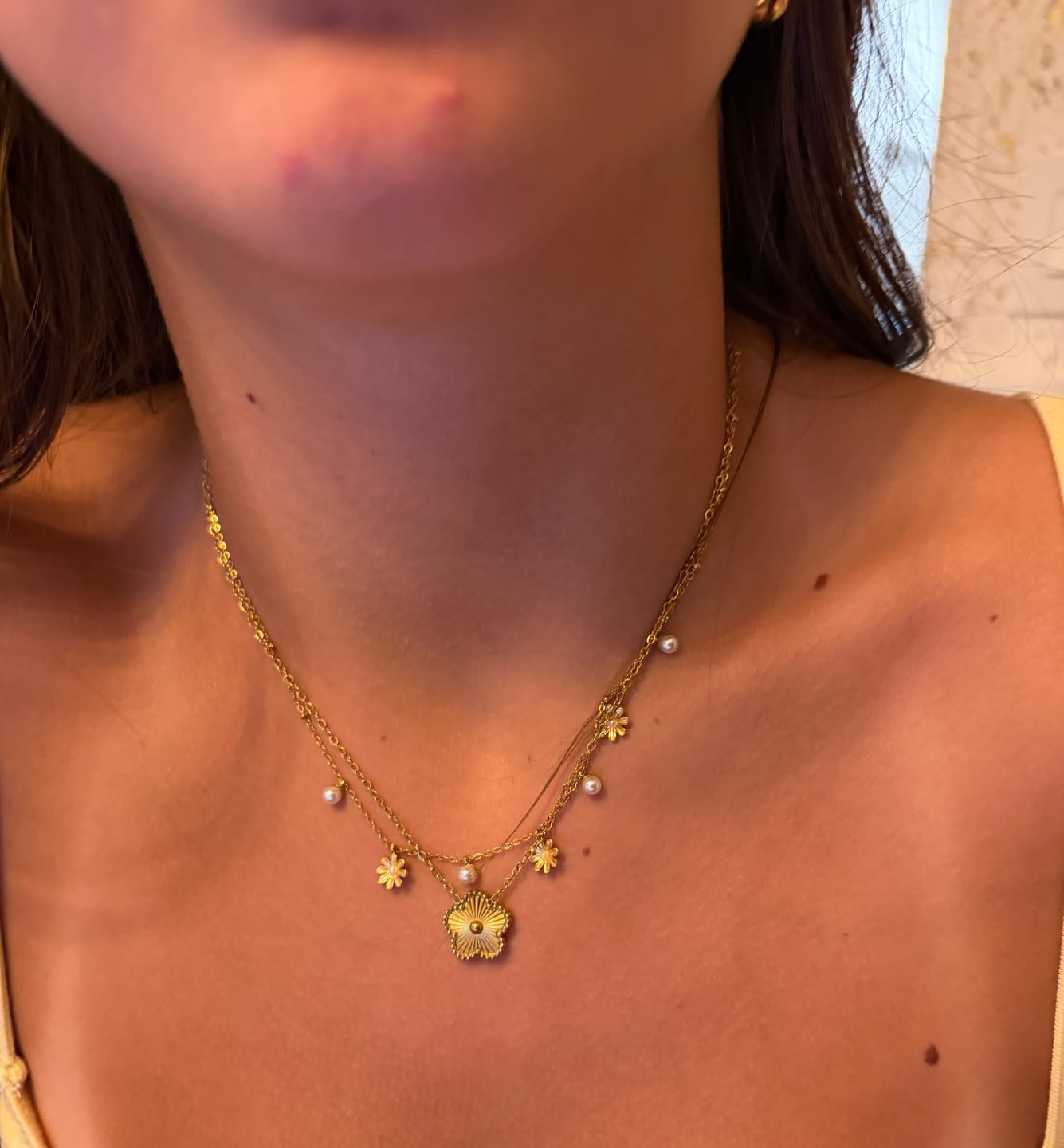 Customer photo review of Golden Clover Hoop Earrings