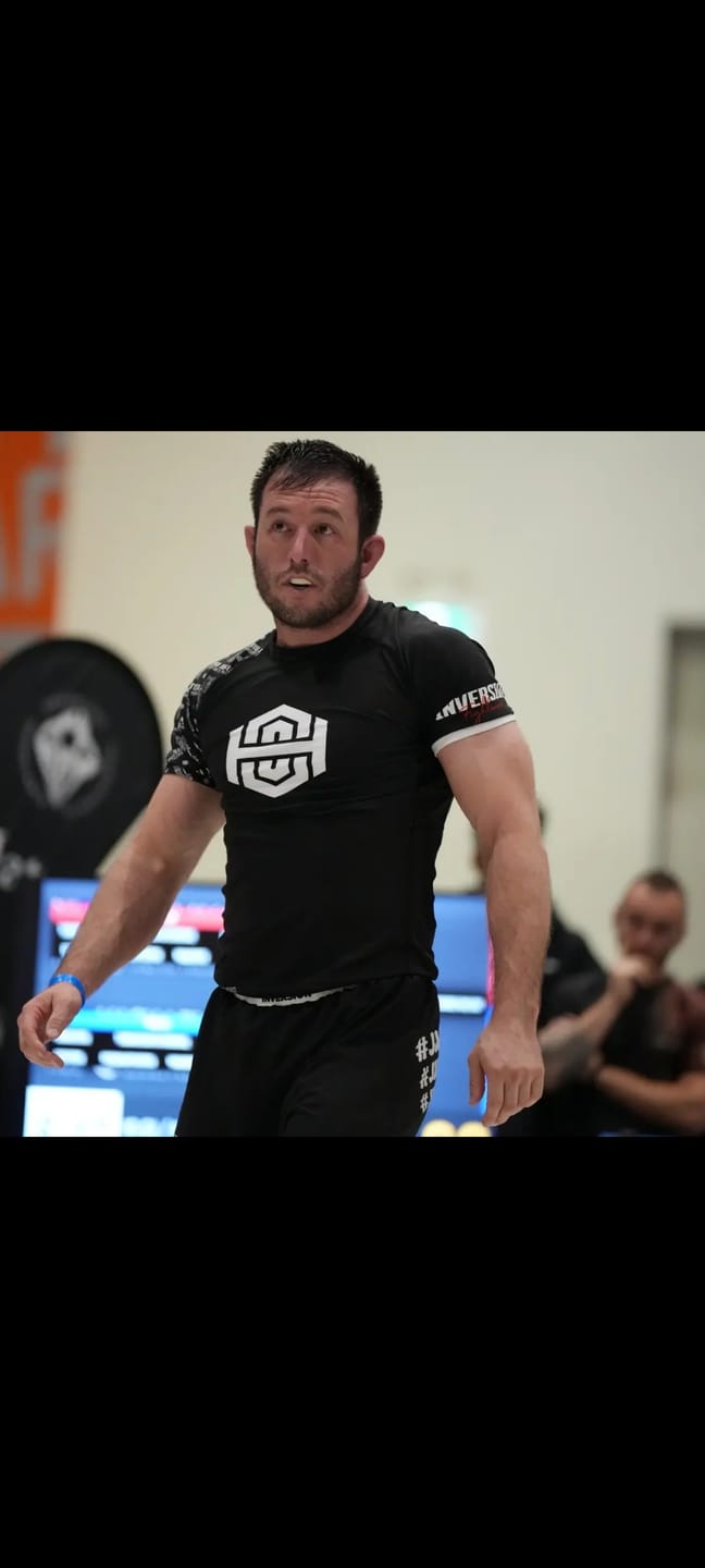 Customer photo review of JJDW BLACK SERIES - COMPETITION BJJ RASH GUARD - BLACK