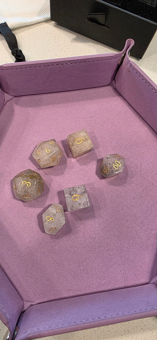 Customer photo review of URWizards D&D Phantom Quartz Gemstone Engraved Dice Set(Limited edition)