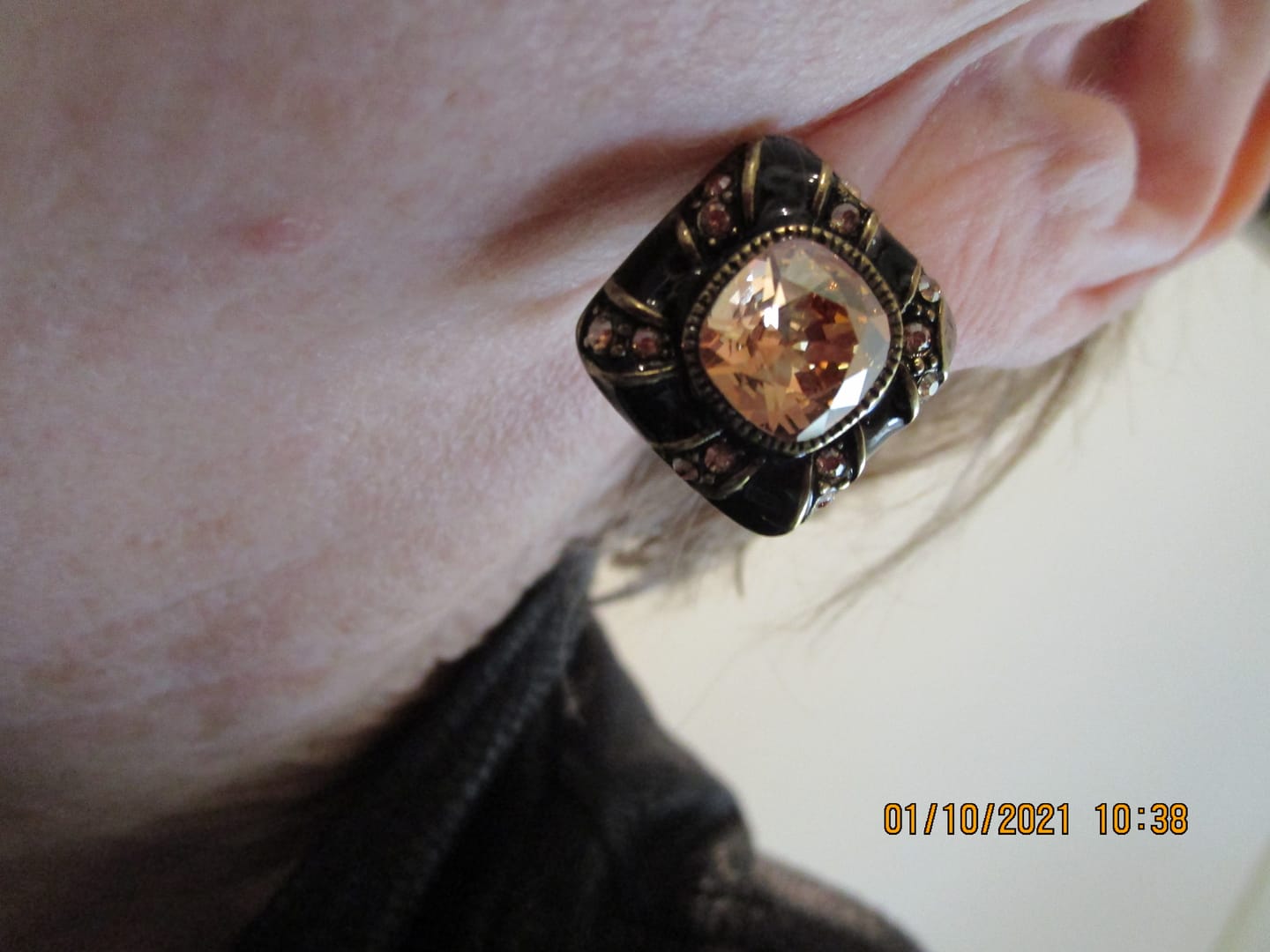 Customer photo review of HEIDI DAUS®"Tempting Tigress" Crystal & Enamel Button Earrings