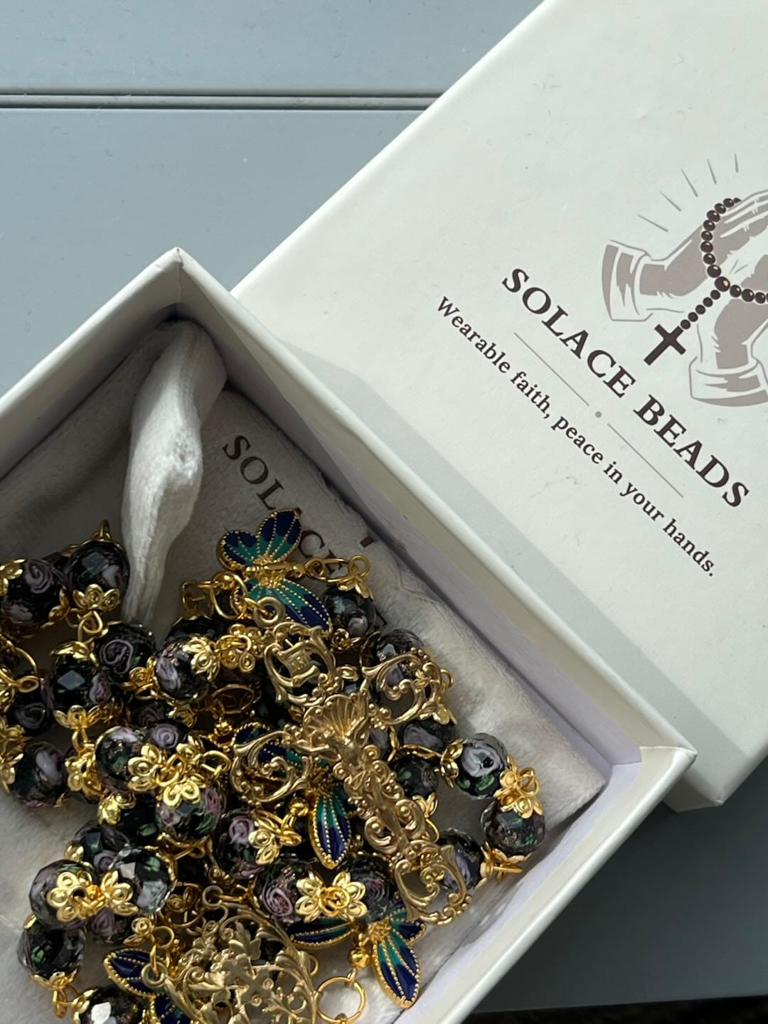 Customer photo review of SolaceBeads Black Lampwork Floral Beads Rosary--The Radiant Grace Rosary: Hand-Blown Solace
