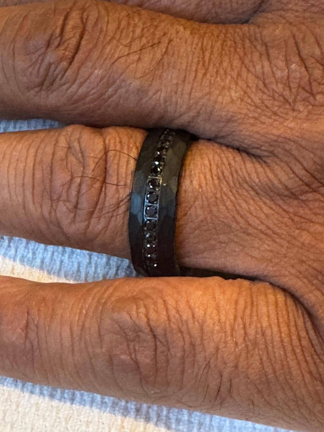 Customer photo review of 8mm - Black Tungsten Hammered Wedding Band, with Black Sapphires Ring