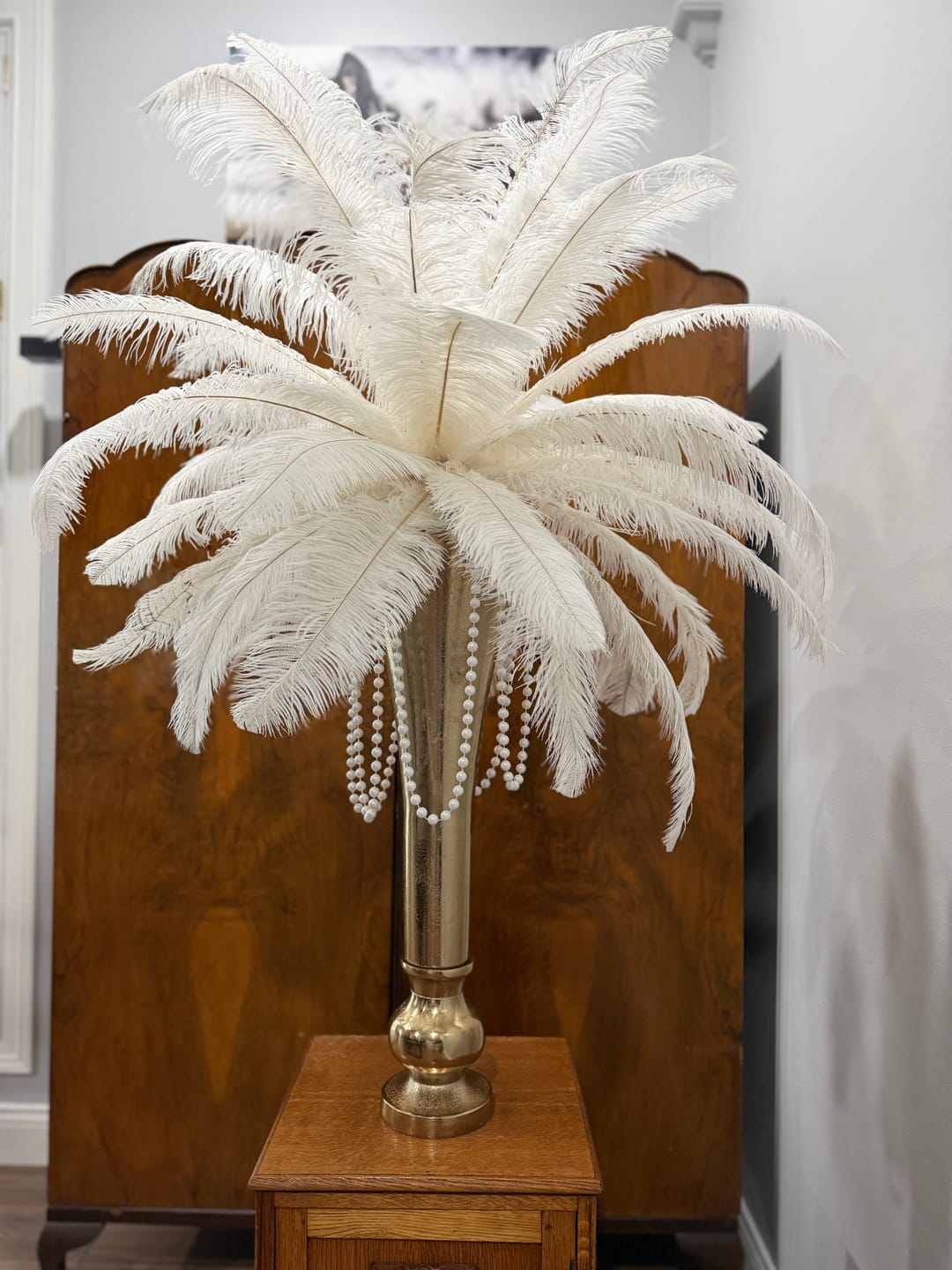 Customer photo review of Ostrich Feather Tail Plumes 13-16" (White)