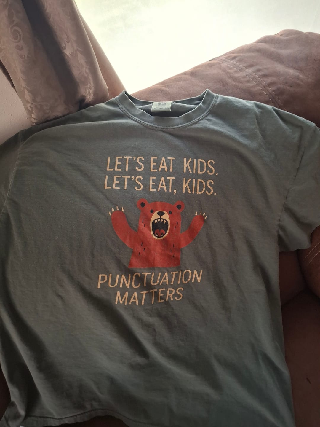 Customer photo review of Punctuation Saves Lives T-Shirt