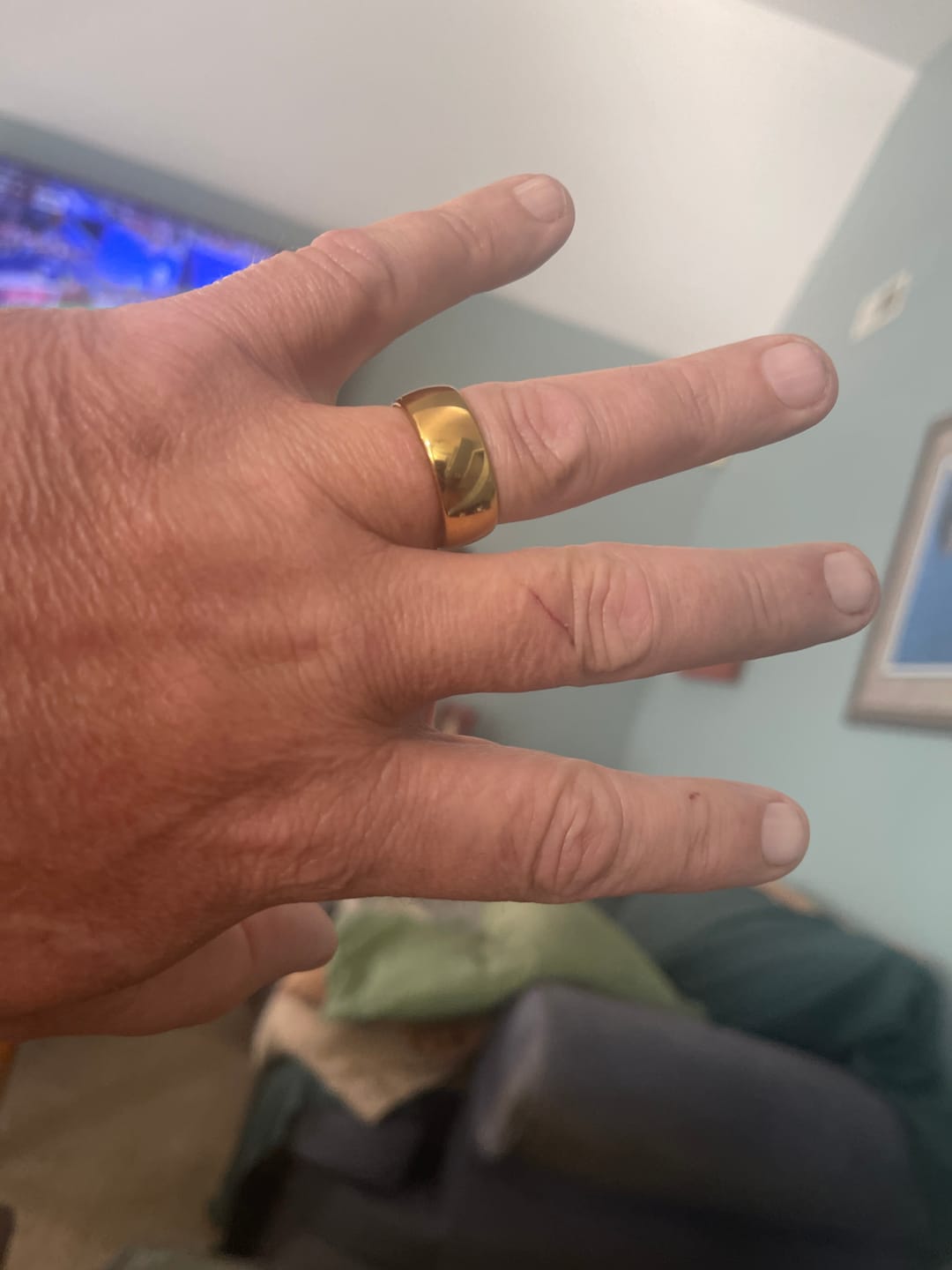 Customer photo review of 9mm - 14k Yellow Gold Tungsten Wedding Band, High Polish Dome Shape, Anniversary Ring
