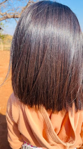 Customer photo review of Vietnamese Super Double Drawn Bone Straight 5x5 Glueless Closure 10" Natural Black Wig