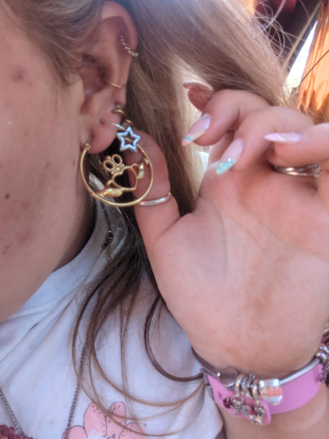 Customer photo review of Claddagh Hoop Earrings