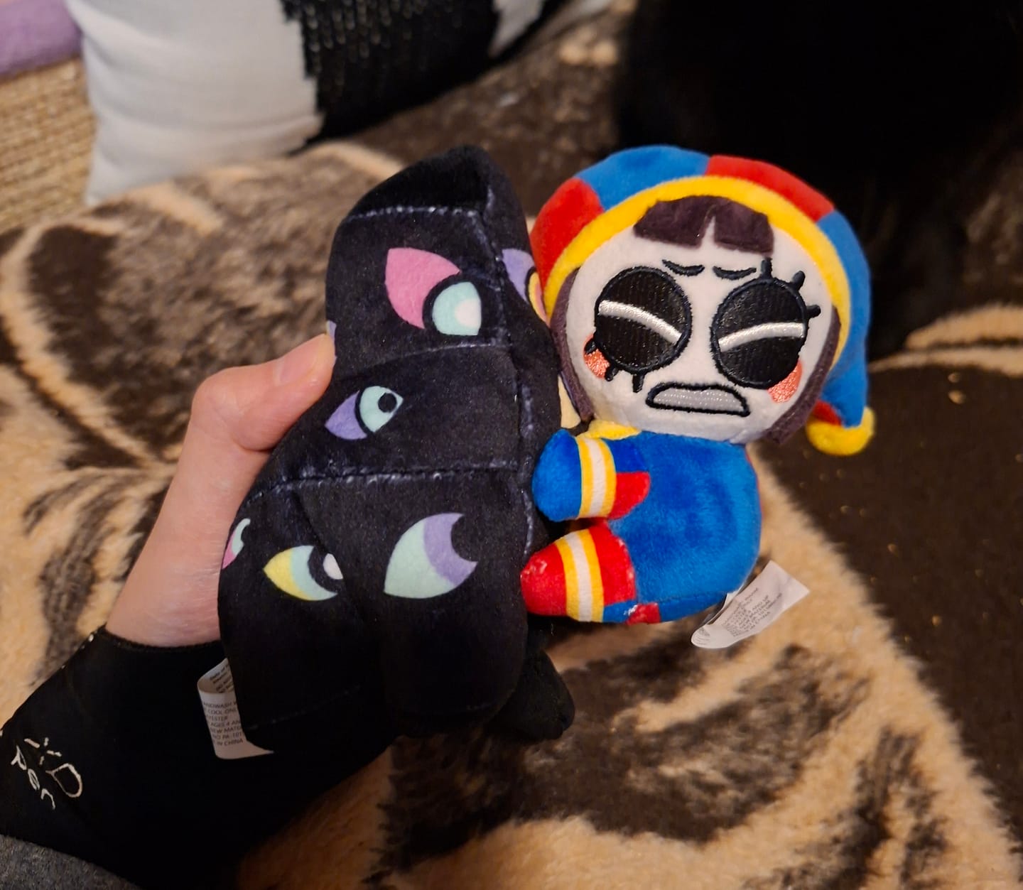 Customer photo review of Pomni & Abstraction Magnetic Plush Keychains