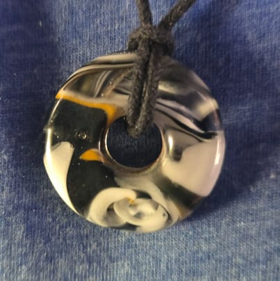 Customer photo review of Taffy Confetti Halo Pendant with Infused Cremation Ashes