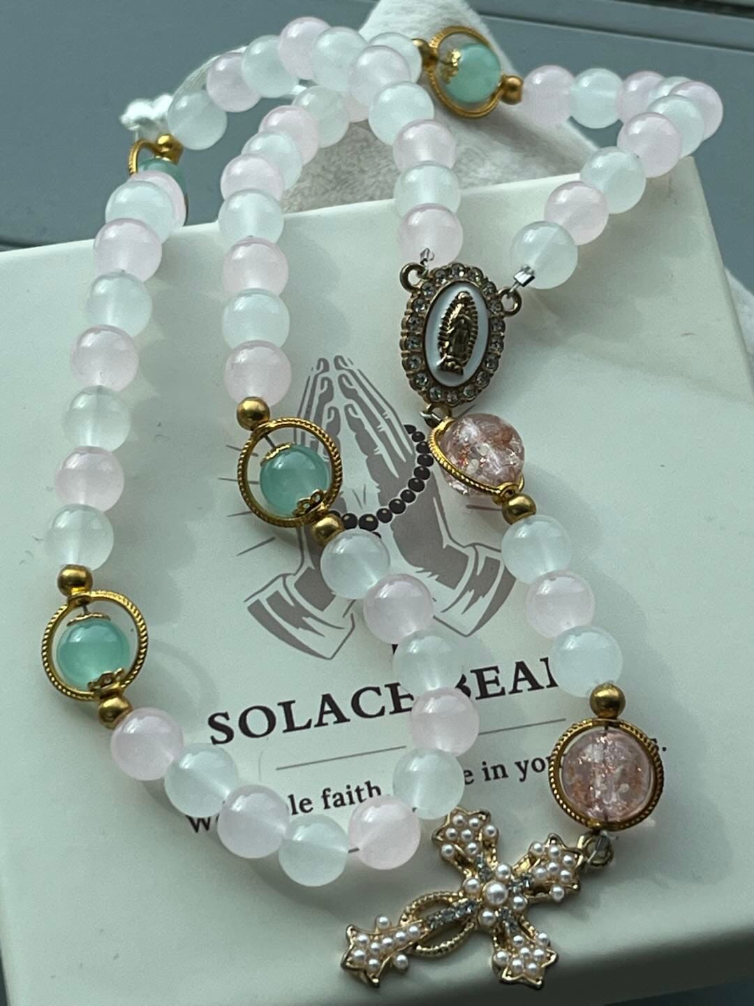 Customer photo review of SolaceBeads Artistic Pink & White Beaded Rosary: A Fusion of Colors & Sacred Symbols